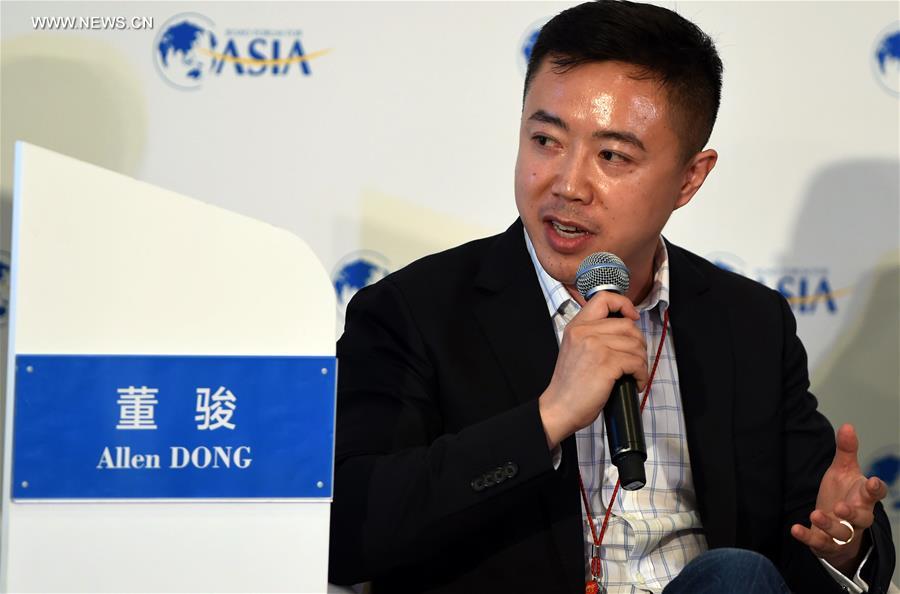 Dong Jun, CEO of Jimu Box, a p2p Internet banking company, speaks on a session of Internet Banking in the annual Boao Forum for Asia (BFA) in Boao, south China's Hainan Province, March 22, 2016. 