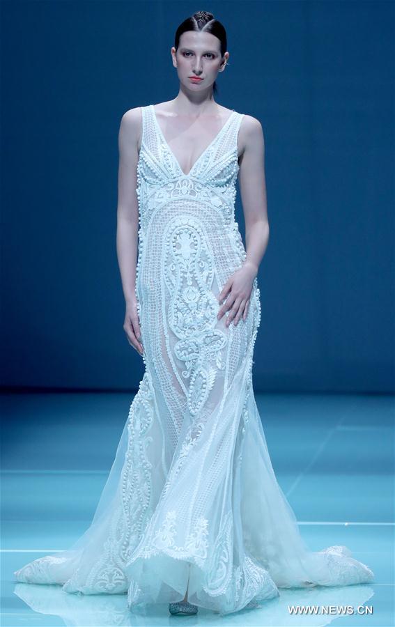 Models present wedding dress during China Fashion Week 12