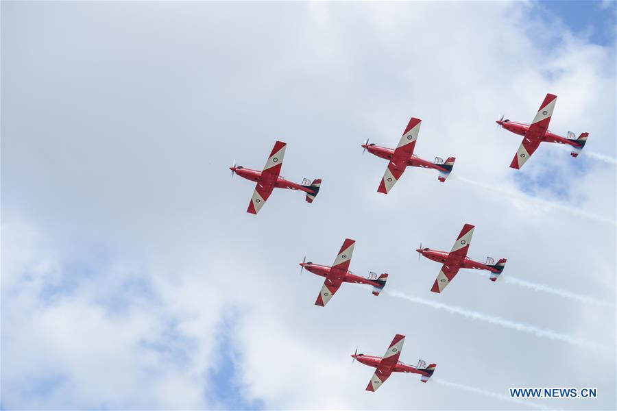 Royal Australian Airforce's Roulettes formation aerobatic display team perform during the Canberra Airport Open Day in Canberra, Australia, April 3, 2016.