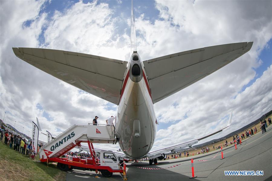 Royal Australian Airforce's Roulettes formation aerobatic display team perform during the Canberra Airport Open Day in Canberra, Australia, April 3, 2016.