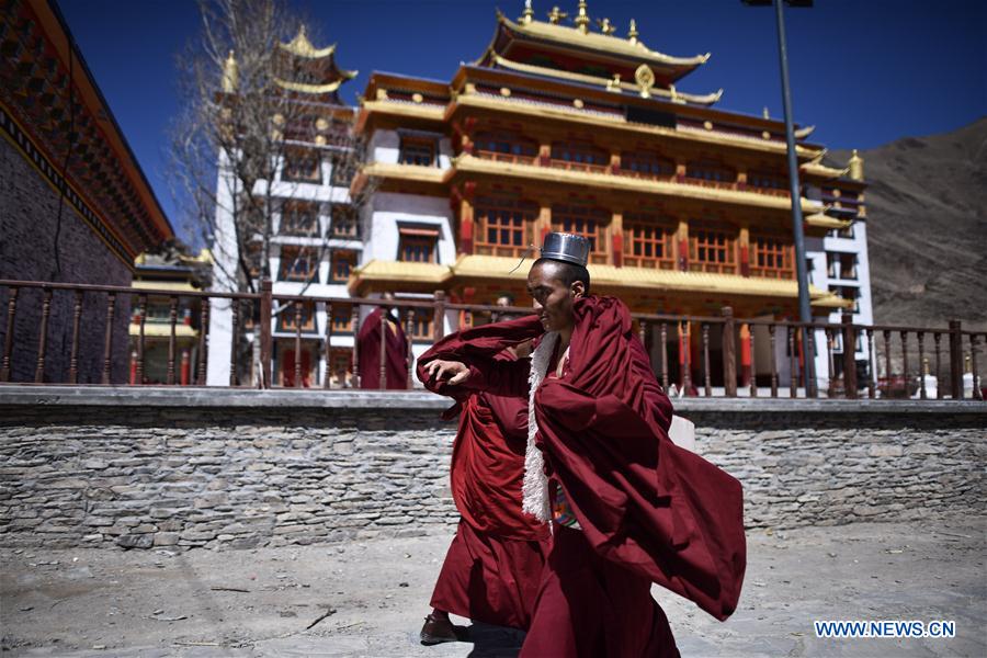 A monk debates on Tibetan Buddhism doctrines at Labu Monastery in Yushu Tibetan Autonomous Prefecture, northwest China's Qinghai Province, April 18, 2016.