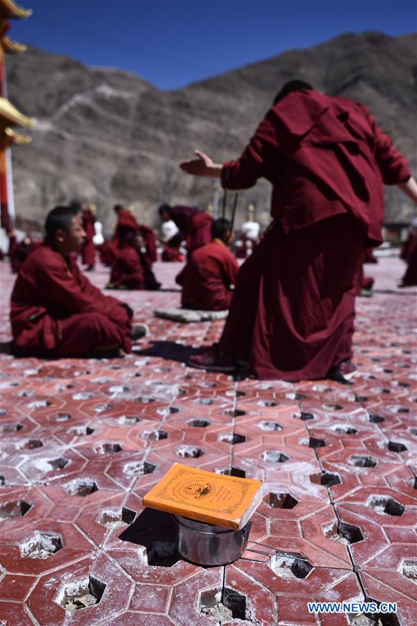 Monks debate on Tibetan Buddhism doctrines at Labu Monastery in Yushu Tibetan Autonomous Prefecture, northwest China's Qinghai Province, April 18, 2016. 