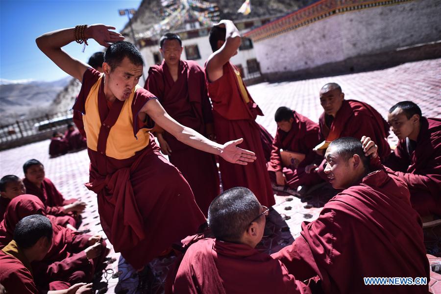 Monks debate on Tibetan Buddhism doctrines at Labu Monastery in Yushu Tibetan Autonomous Prefecture, northwest China's Qinghai Province, April 18, 2016.