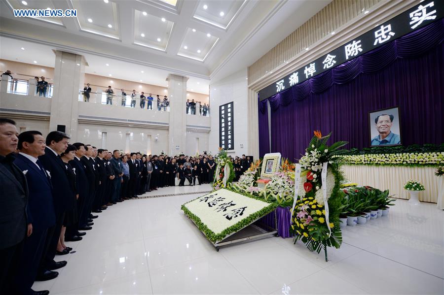 People from all walks of life attend a farewell ceremony of famous writer Chen Zhongshi at the funeral parlor in Xi'an, northwest China's Shaanxi Province, May 5, 2016. 