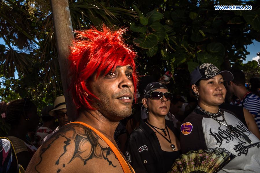 People take part in a march against homophobia, in Havana, capital of Cuba, on May 14, 2016.