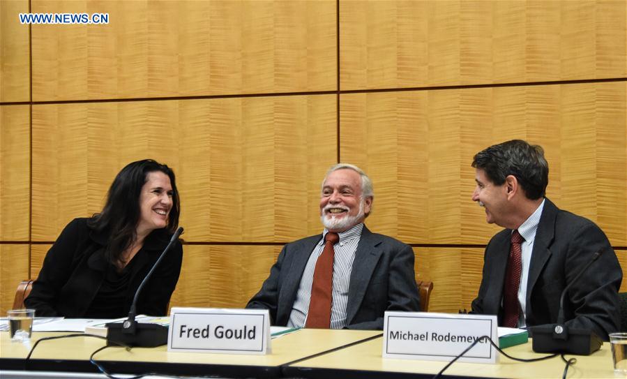 Fred Gould (C), chairman of the study committee on genetically engineered (GE) crops, speaks at a news conference in Washington, the United States, on May 17, 2016.