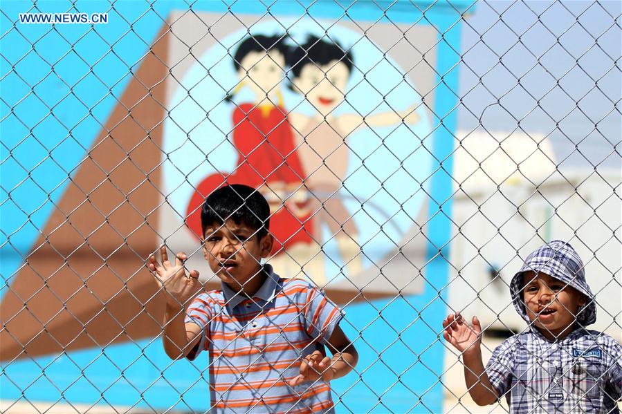 Syrian children are seen at the Mrajeeb Al Fhood refugee camp, east of the city of Zarqa, Jordan, May 31, 2016.