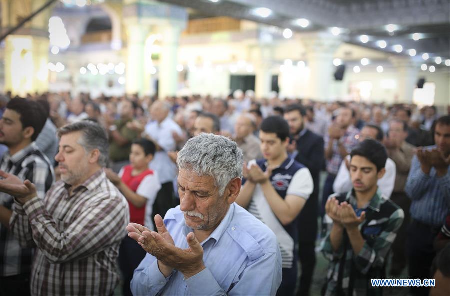 Muslims pray during the holy month of Ramadan in a mosque at the shrine of Shiite Saint Abdulazim in Shahr-e Rey, south of Tehran, Iran, June 13, 2016.