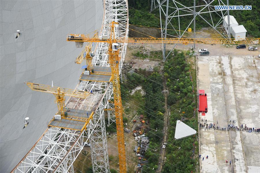 The last triangular panel to the reflector of the Five-hundred-meter Aperture Spherical Telescope (FAST) is being transported in Pingtang County, southwest China's Guizhou Province, July 3, 2016.