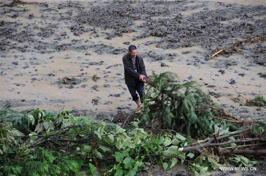 China's meteorological authority renewed its orange alert for heavy rain in the south and southwest of the country on Monday. 