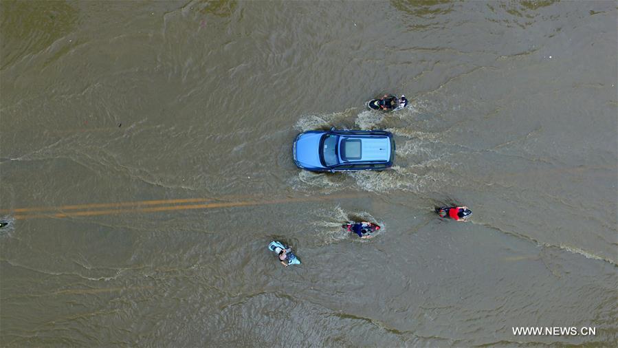 A rainstorm hit Yangzhou Tuesday