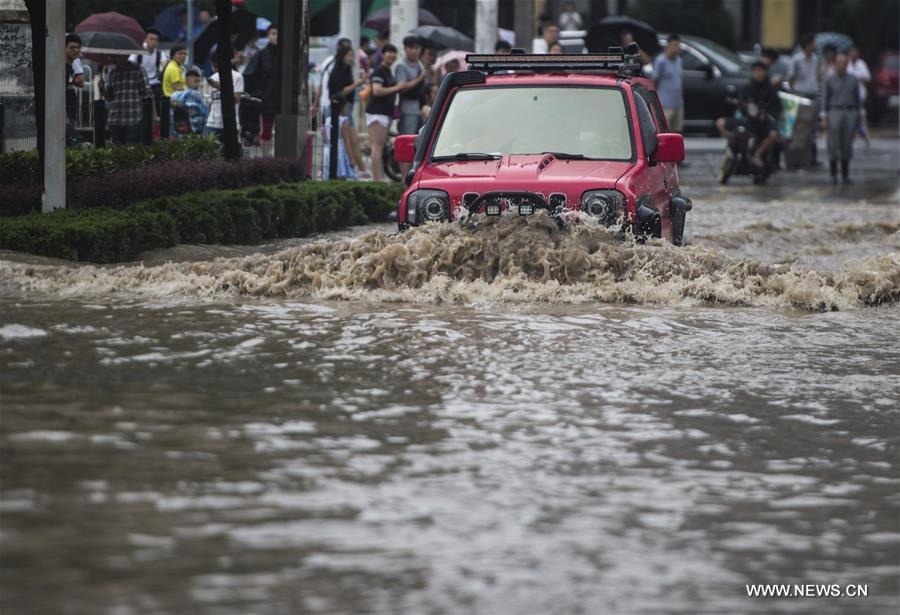 The downpour caused severe waterlogging as rivers, lakes and reservoirs of the city have swollen, leading to closure of a tunnel across the Yangtze as well as some subway stations and underground passages, according to local traffic authorities. 