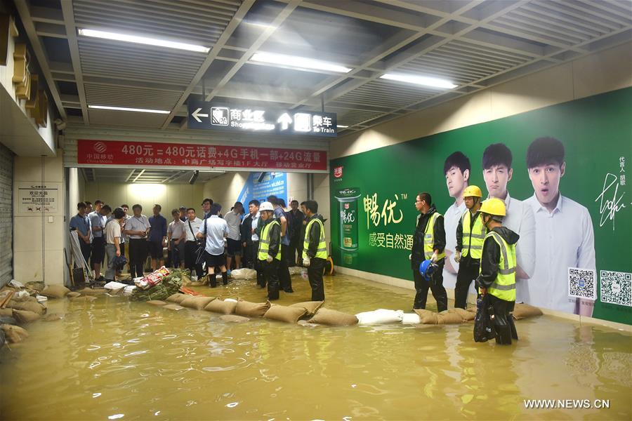 The downpour caused severe waterlogging as rivers, lakes and reservoirs of the city have swollen, leading to closure of a tunnel across the Yangtze as well as some subway stations and underground passages, according to local traffic authorities. 