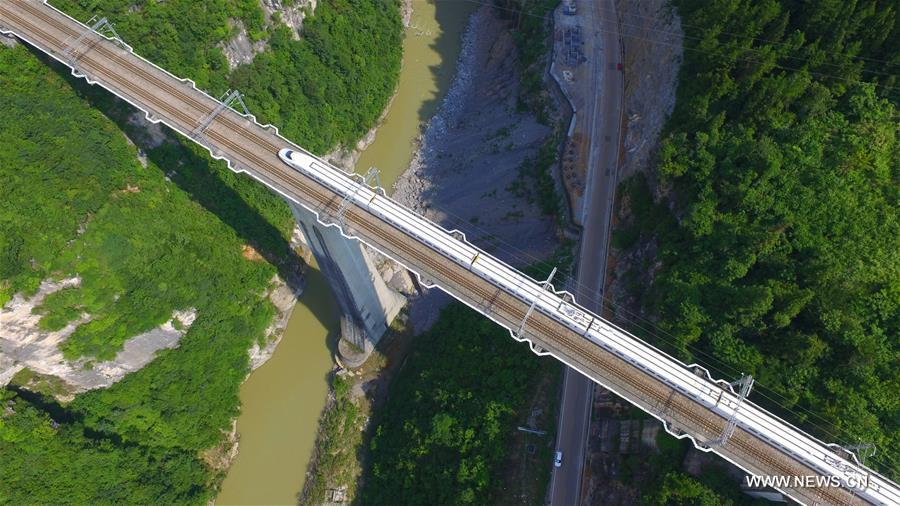 The 377-kilometer-long Yichang-Wanzhou Railroad winds through mountainous areas from its eastern station Yichang in Hubei Province to western station Wanzhou in southwest China's Chongqing.