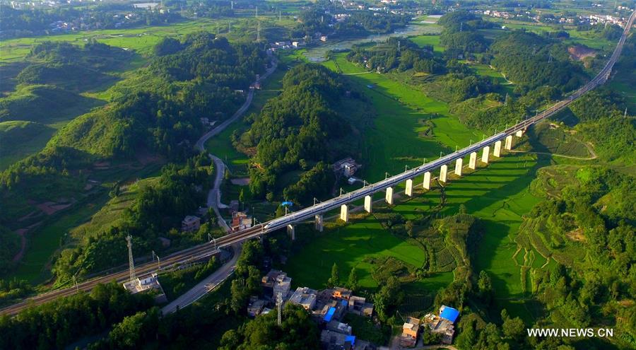 The 377-kilometer-long Yichang-Wanzhou Railroad winds through mountainous areas from its eastern station Yichang in Hubei Province to western station Wanzhou in southwest China's Chongqing.