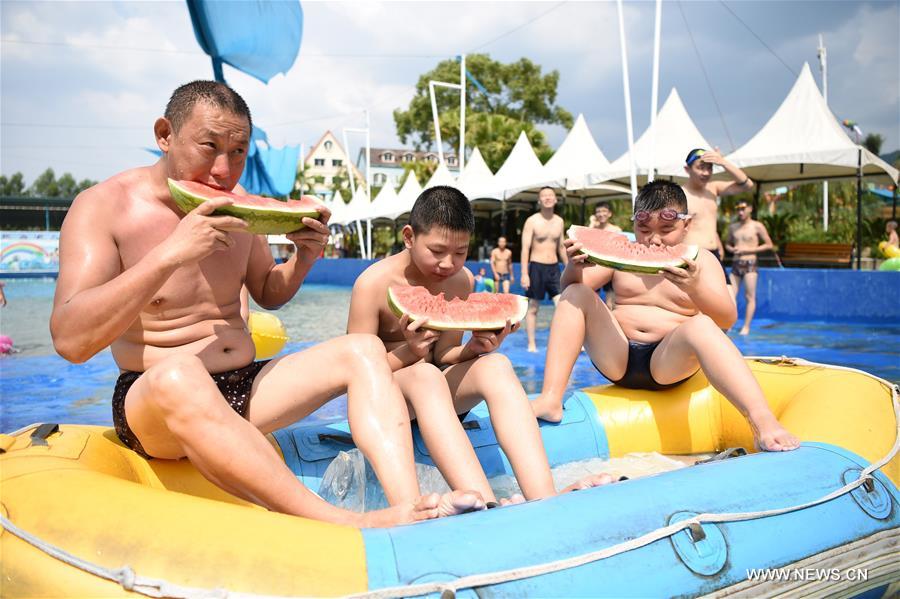 With highest temperature reaching 40 degrees Celsius, local meteorological authorities on Tuesday issued a red alert for high temperatures, urging people to reduce outdoor activities