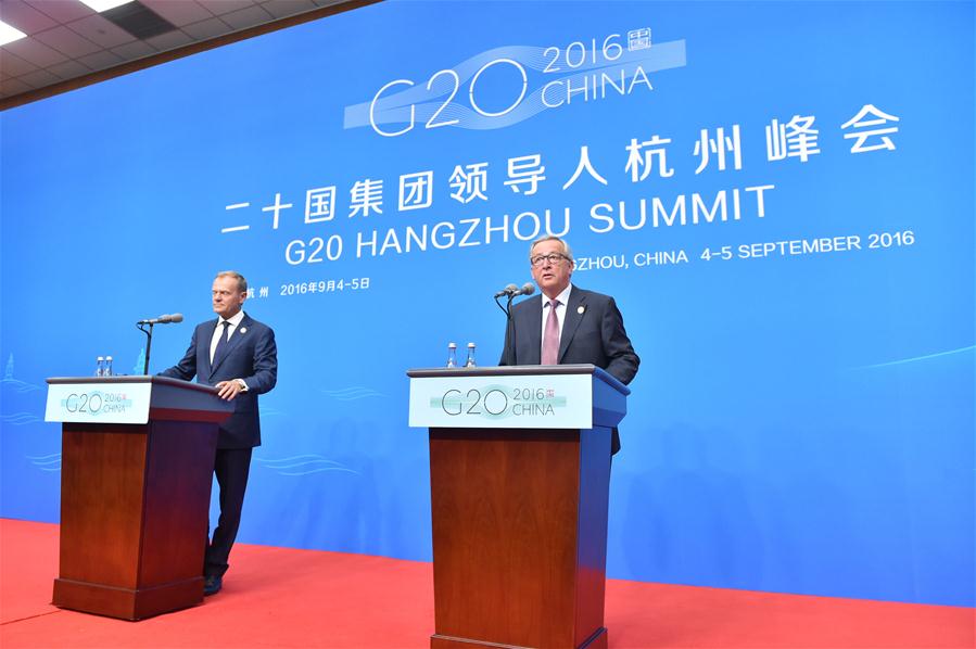 European Commission President Jean-Claude Juncker (R) speaks during the EU Delegation press conference of the G20 Summit in Hangzhou, capital of east China's Zhejiang Province, Sept. 4, 2016. (Xinhua/Li He) 