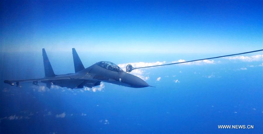 The Chinese Air Force on Sunday sent more than 40 aircraft of various types to the West Pacific, via the Miyako Strait, for a routine drill on the high seas, a spokesperson said. Bombers and fighters of the PLA Air Force also conducted routine patrol in the East China Sea Air Defense Identification Zone (ADIZ). 