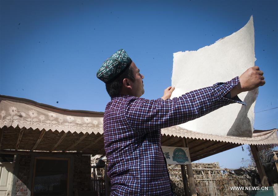 The handmade mulberry-bark paper, originating thousands of years ago in Xinjiang, has been listed as intangible cultural heritage by the UNESCO.