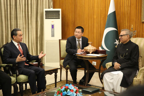 Chinese State Councilor and Foreign Minister Wang Yi (L) meets with Pakistani President Arif Alvi (R) in Islamabad, Pakistan on Sunday, September 9, 2018. [Photo: fmprc.gov.cn]