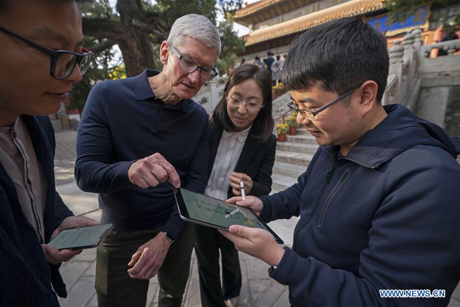 Apples Ceo Tim Cook Visits Beijing Peoples Daily Online