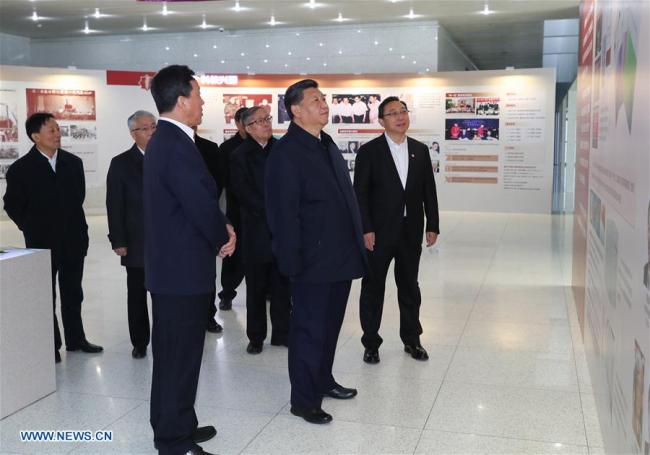 Xi Jinping, general secretary of the Central Committee of the Communist Party of China, Chinese president and chairman of the Central Military Commission, visits an exhibition on Nankai University's 100-year history at the university in Tianjin, Jan. 17, 2019. [Photo: Xinhua/Xie Huanchi]