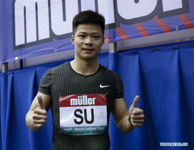 China's Su Bingtian celebrates after winning the men's 60m final at the IAAF Indoor Grand Prix in Birmingham, Britain on Feb. 16, 2019. [Photo: Xinhua/Han Yan]