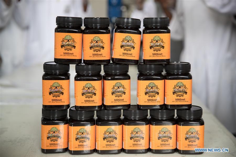 Bottles of honey are seen at Mpundu Wild Honey, a Chinese-run firm, in central Zambia\'s Kabwe town, on Nov. 2, 2018. The firm has exported first consignment of honey to the Chinese market in October 2018. Food of a particular place is an important symbol of local geographic and cultural characteristics. Food carries history and tradition, leads the tide of trade, strengthens diplomatic relations, disseminates and promotes culture. Food has been serving as connections between people around the world. In ancient times, food such as grapes, pomegranates, walnuts, coriander, cucumbers and sesame seeds were introduced to China along the Silk Road. Nowadays, thanks to the Belt and Road Initiative, red wine, coffee, dried fruits, meat, seafood, and dairy products from foreign countries enter the homes of ordinary people, turning daily meals into feasts with exotic cuisines. (Xinhua/Peng Lijun)