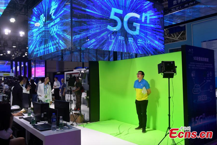 An exhibition booth of China Unicom shows the 5G-empowered studio at the second Digital China Summit in Fuzhou, Fujian Province, May 5, 2019. (Photo: China News Service/Lyu Ming)